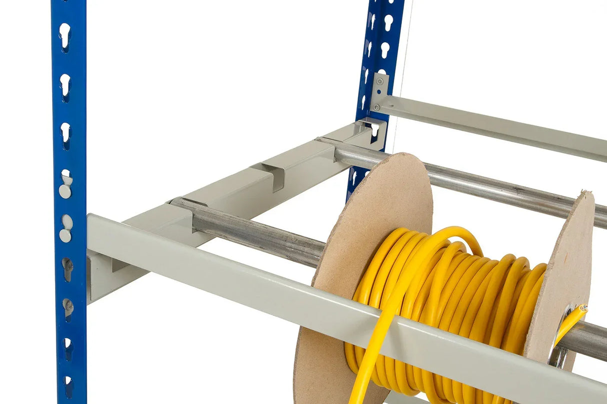 Close-up of cable reel storage system showing steel support arms and mounted cable reels