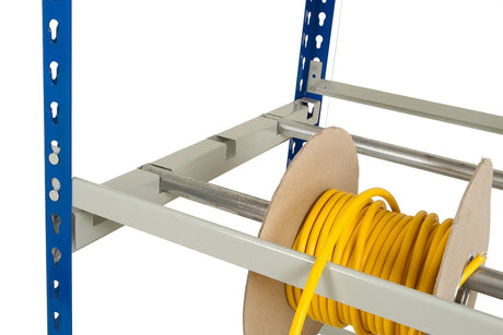 Close-up of cable reel storage system showing steel support arms and mounted cable reels